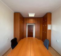 Offices with wooden cabinets and wood-decor flooring.