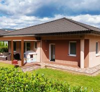 A family house in Bytča with a terrace, landscaped garden, and children's playground.