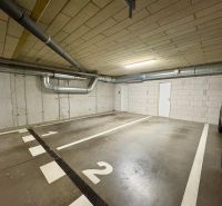 Underground parking lot on Hornostavska Street in Nitra with parking spaces.
