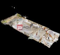 3D model of a production space with a wood-decor floor and equipment.