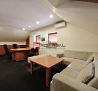 Production premises with a comfortable sofa, office furniture, and air conditioning.