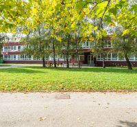 A building surrounded by trees in Košice - Staré Mesto district on Novomeského Street.