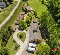 Aerial view of a family house in Hamuliakovo surrounded by greenery and nature.