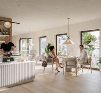 A café in offices with wood-decor flooring, two people, and a bar counter.