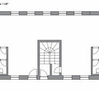 Ground floor plan with offices, restrooms, and staircase.