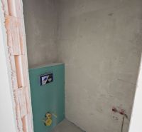 Unfinished toilet in a 3-room apartment with basic plumbing.