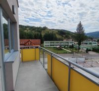 The balcony of a 2-room apartment on Školská Street in Hriňová with a view of the hills.