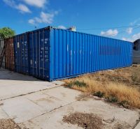 Storage containers outdoors in Sokolovce under a blue sky.