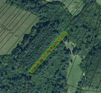 Aerial view of a plot on agricultural and forest land in Plaveč.