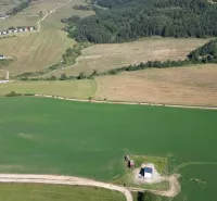 Aerial view of agricultural and forest lands around Stará Ľubovňa.