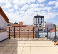 A terrace with a view of the rooftops in Bratislava - Old Town on Klemensova Street.