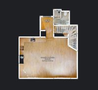 A floor plan of a 5 or more room apartment with a wood decor floor includes a kitchen, bathroom, and staircase.