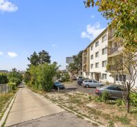 Apartment building on Matúškova Street, Bratislava - Nové Mesto, surrounded by greenery and parking.