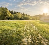 Plots for residential housing in Raková, Raková with a view of greenery and sunlight.