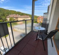 A balcony in a one-room apartment with a view of the surroundings of the town Liptovský Mikuláš.