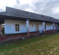 A family house in Opatovská Nová Ves with an older exterior and a sloped roof.