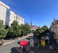 View of Hlavná Street in Košice, the Staré Mesto district, with cyclists.