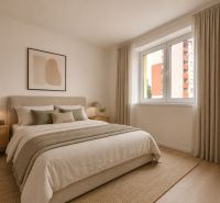 A bright bedroom with a large bed, a painting, and a wooden-decor floor in a 3-room apartment.