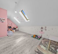 Attic children's room with toys in a family house. Floor with wooden decor.