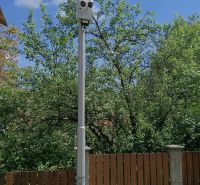 Solar lighting with a camera by the fence in the garden of a family house in Mikušovce.