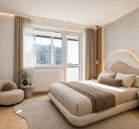 A bedroom in a 3-room apartment with a wood-patterned floor, beige furniture, and a large window.