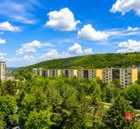 View from a 2-room apartment on Studenohorská Street in Bratislava-Lamač. Meadows and forests in the background.