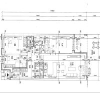The floor plan of the family house shows the layout of the rooms, including the kitchen and living room.