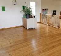 Interior of a family house with a separate cabinet and wooden decor flooring.