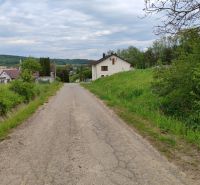 Plots - residential on Hlavná Street in Tovarnianska Polianka, surrounded by greenery and rural environment.
