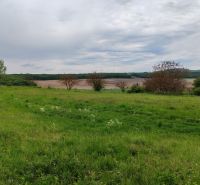 Plots - housing on Hlavná Street in Tovarnianska Polianka with a view of the countryside.