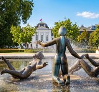 Fountain with bronze sculptures and the president in the gardens in Bratislava – Old Town on Banskobystrická.