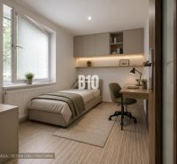 Children's room in a 3-room apartment with a bed, a desk, and a wooden decor floor.