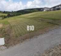 Plots - housing in Bitarová on a slope with a view of the rural landscape and houses.