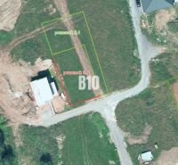 Aerial view of residential plots in the village of Bitarová, showing the surrounding area.
