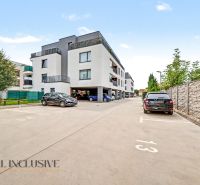 A new building on Na piesku street in Bratislava - Nové Mesto, with parking spaces.