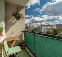 A balcony with floral decorations in a 3-room apartment on Ludvíka Svobodu in Poprad.