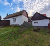 A family house on Prieloh Street in Dolná Strehová with a wooden fence and an extension.