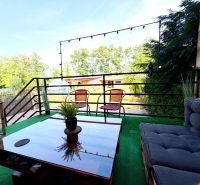 The terrace of a family house in Lúčnica nad Žitavou in Vajka nad Žitavou with comfortable seating.