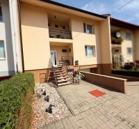 A family house on Vajka nad Žitavou Street in Lúčnica nad Žitavou with a front garden and a bicycle.