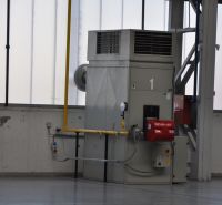 Industrial hall with technical equipment and metal structures in production areas.