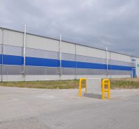 Production premises on Priemyselná Street in Galanta with a blue-gray design and a truck.