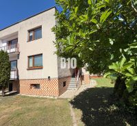A family house in Kláštor pod Znievom with greenery and a balcony, set in a spacious garden.