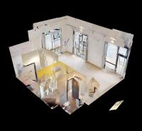 3D view of commercial space with wood-decor flooring.