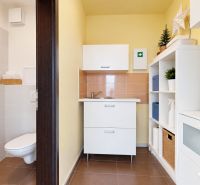 5OC Commercial spaces with a sink and shelves, flooring with a wooden decor.