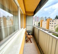 A balcony with seating on Sekurisova Street in a 1-room apartment in Bratislava - Dúbravka.