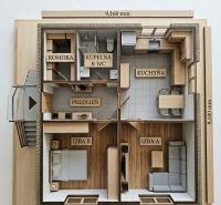 Floor plan of a family house with an entrance hall, a room with wooden decor, and a kitchen.