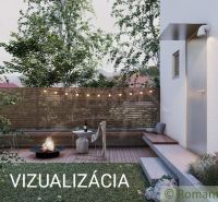 A family house in Banská Bystrica, a garden with a fireplace, a wooden fence, a cozy atmosphere.