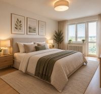 Bright bedroom in a 2-room apartment with a bed and decorations on a wooden-decor floor.
