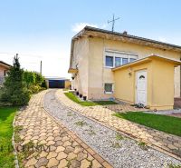 A family house in Vojtechovce in Nový Život with a garden and a driveway.