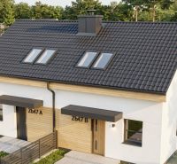 A family house in Sasinkovo on Sasinkovo Street with a dark roof and wooden details.